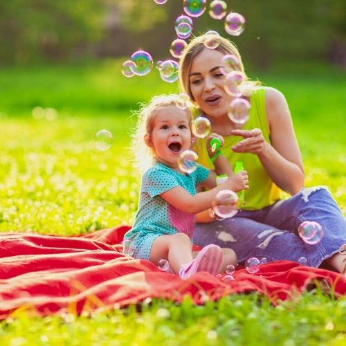 blowing bubbles at a picnic (1) blowing bubbles at a picnic (1)