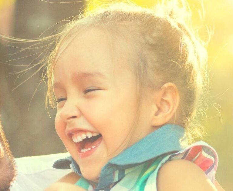 dad little girl smiling